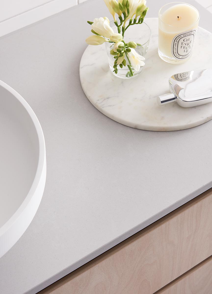 Bathroom vanity with Laminex Raw Birchply and Essastone Ash Concrete