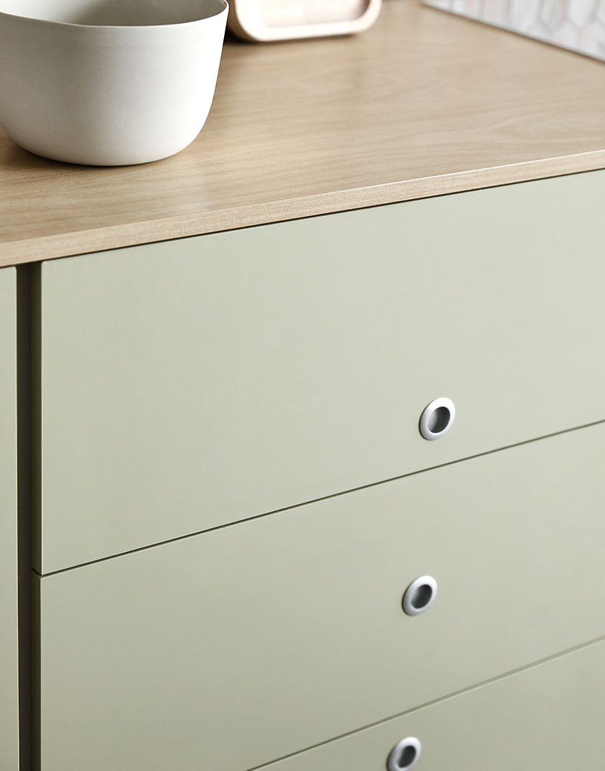 Kitchen cabinetry featuring drawers in Laminex Seed and benchtop in Laminex Raw Birchply