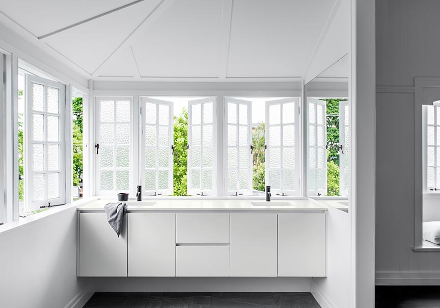 White kitchen with floating vanity